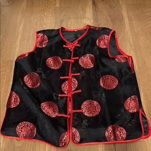 Black Vest with Red Patterns and Trim